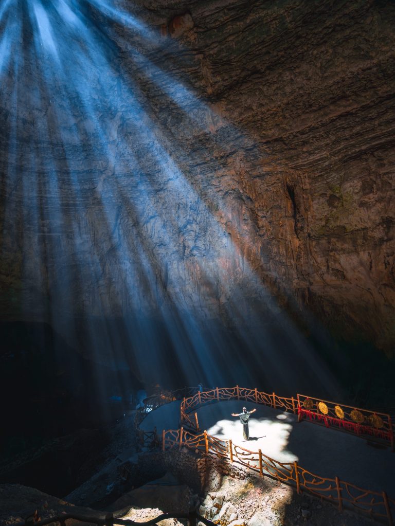 Dramatic cave interior with walkway