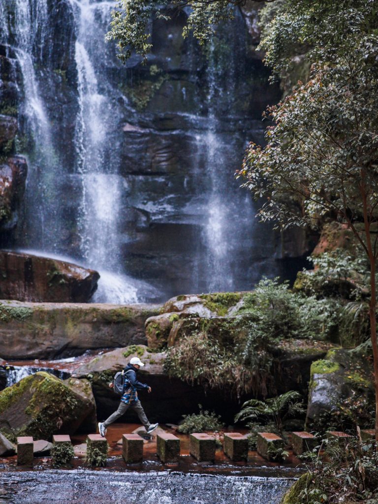 Hiker near waterfall