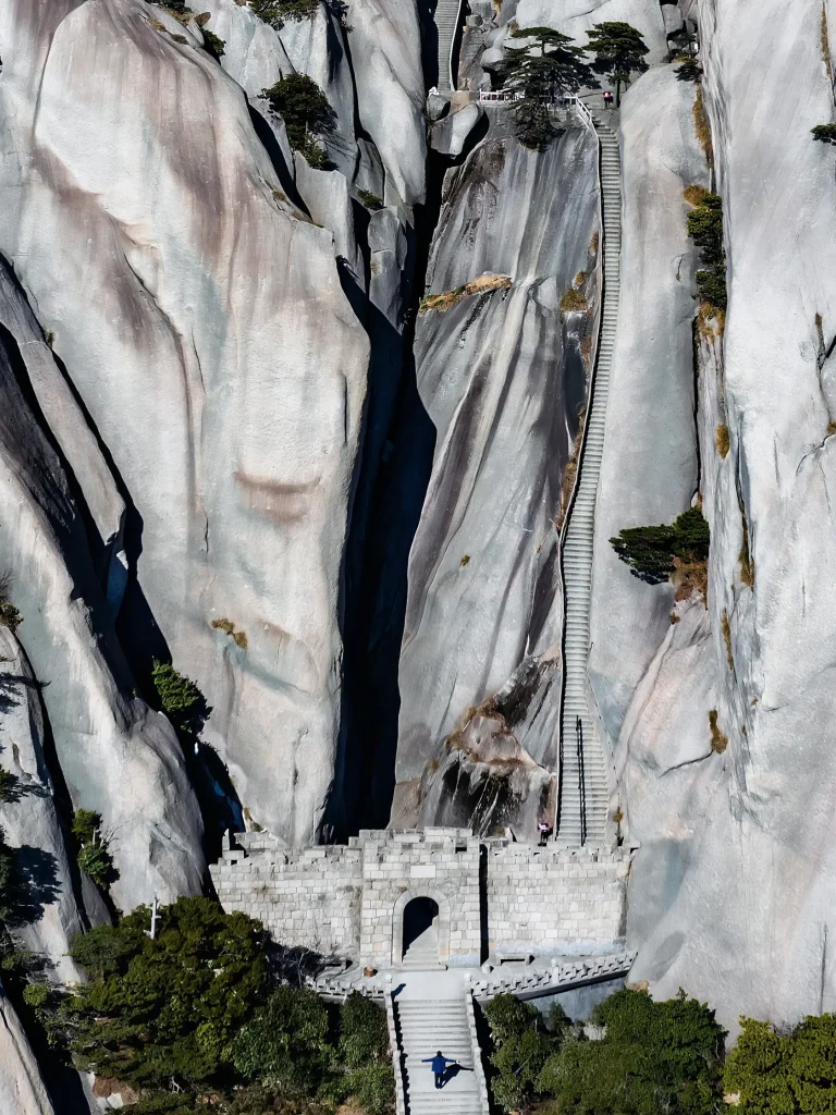 Steep stone staircase carved into cliff face