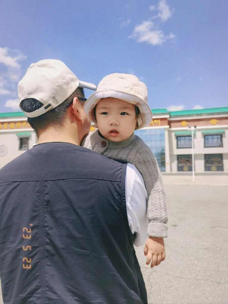 Father and child at historical site