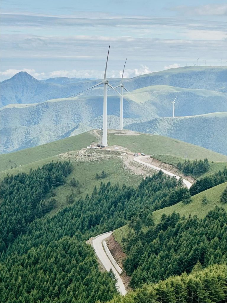 Wind turbines on a mountain road, a scenic part of the Jing-Jin-Ji Hiking Adventure