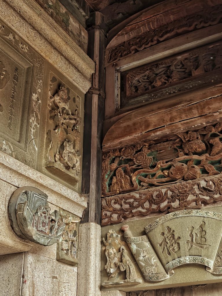 Lingtong Rock Temple clinging to cliffside with waterfall - Fujian Tulou Exploration Adventure