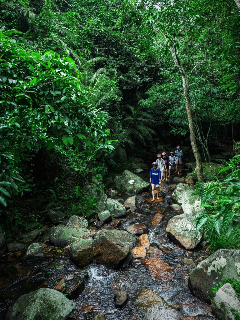 Hainan Tropical Rainforest Adventure river trekking